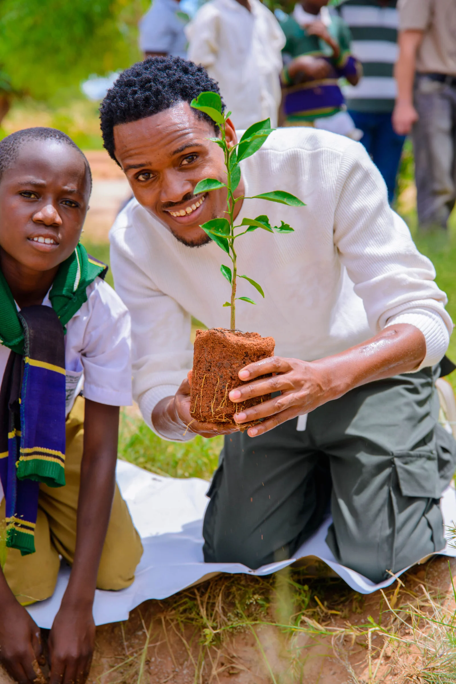 FRIDA AMANI COLLABORATED WITH CHILDREN TO PLANT TREES AT MPAMANTWA PRIMARY SCHOOL.